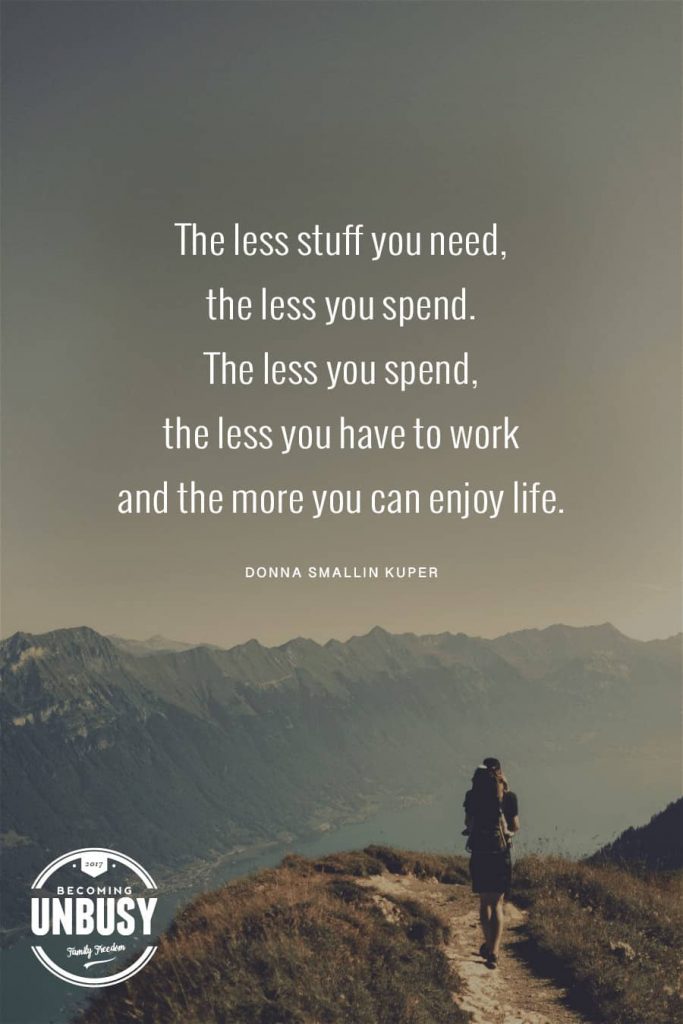 A woman hiking on a mountain with the minimalism quote, "The less stuff you need, the less you spend. The less you spend, the less you have to work and the more you can enjoy life."