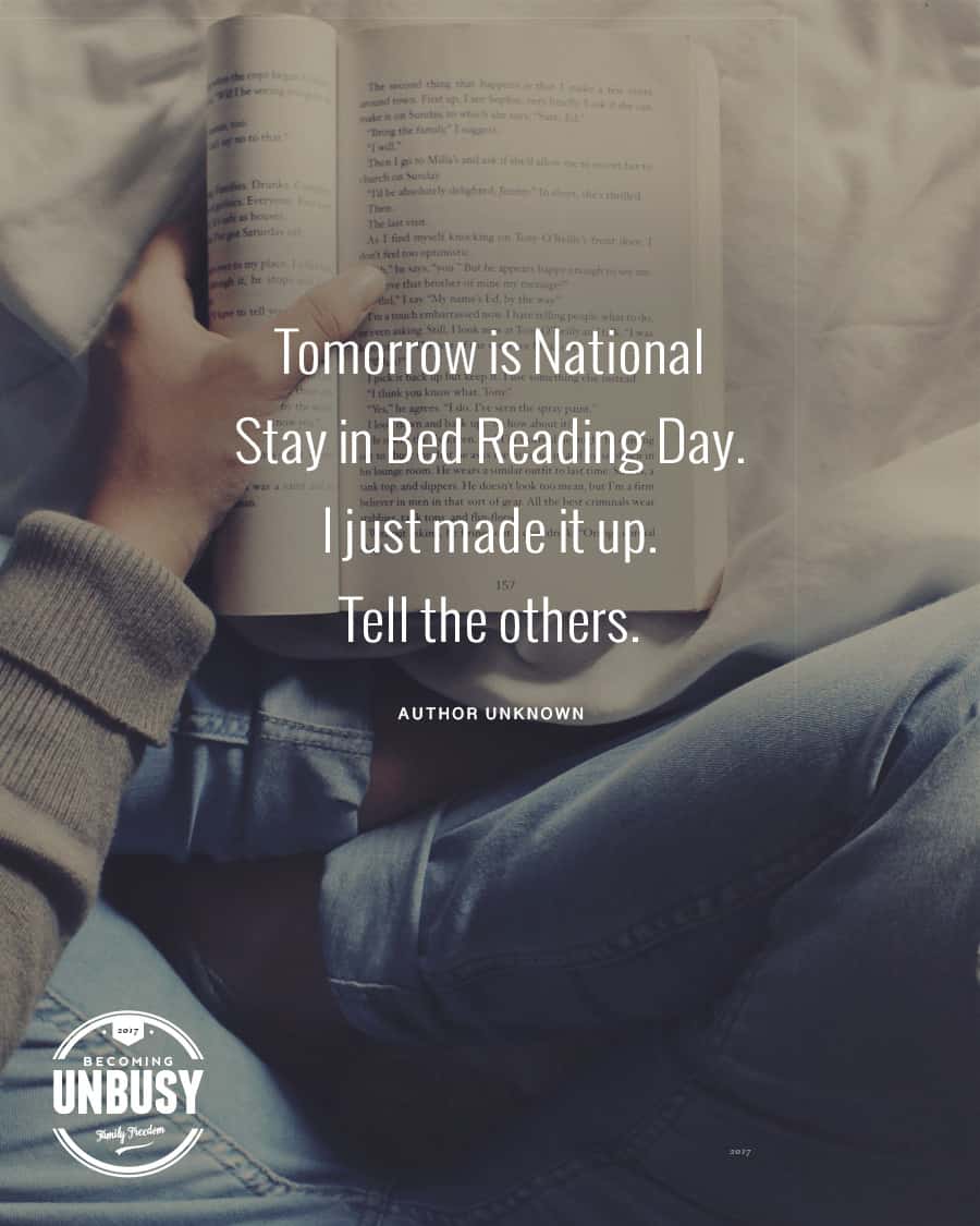 Woman reading a book in bed with the quote, "Tomorrow is National Stay in Bed Reading Day. I just made it up. Tell the others."