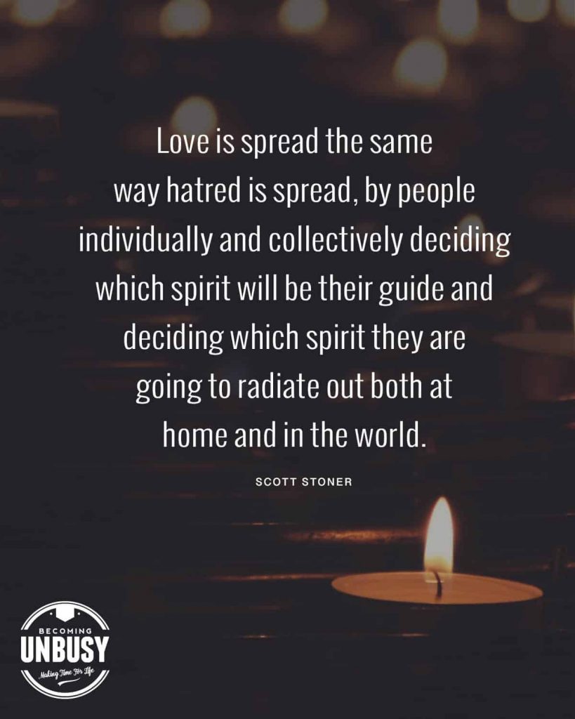 A lit votive candle with the following quote written overtop, "Love is spread the same way hatred is spread, by people individually and collectively deciding which spirit will be their guide and deciding which spirit they are going to radiate out both at home and in the world."