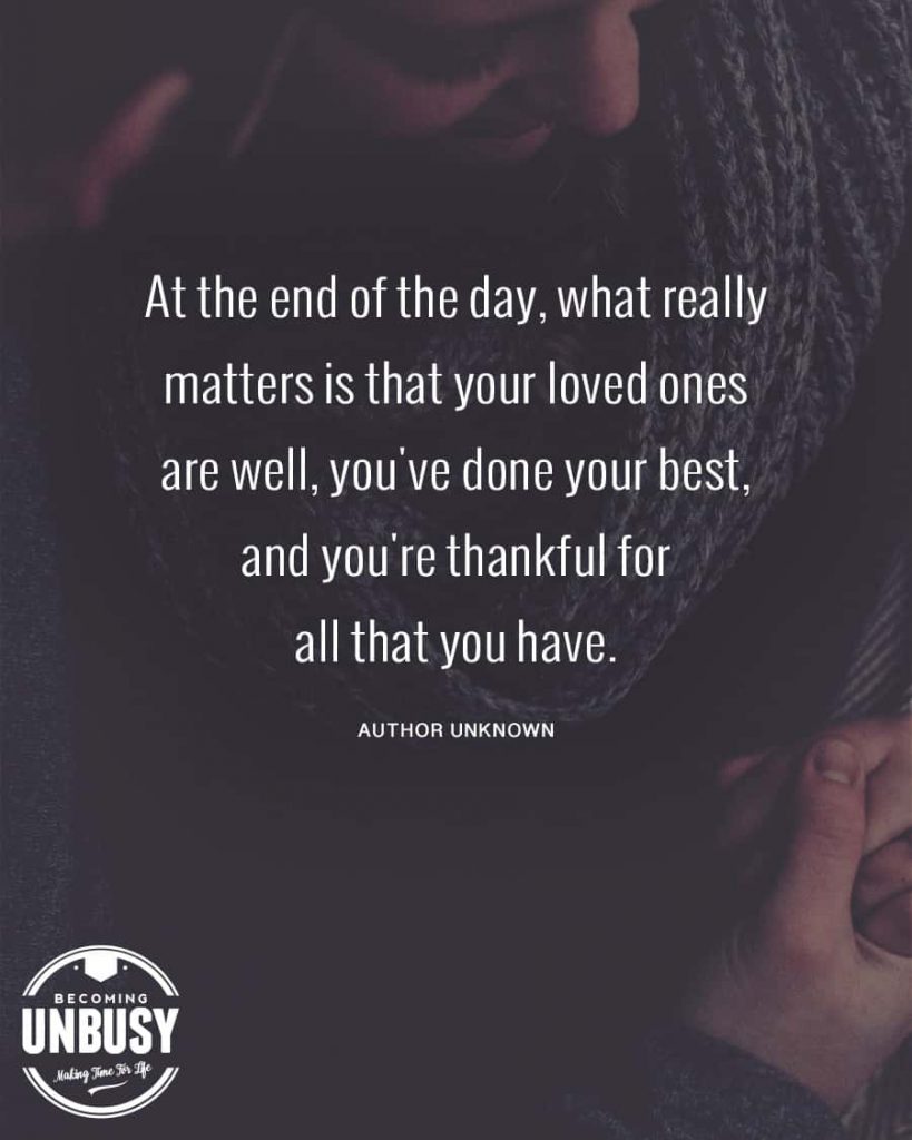 A woman wearing a winter scarf holding someone's hand with a quote about a simple life over top reading, "At the end of the day, what really matters is that your loved ones are well, you've done your best, and you're thankful for all you have."