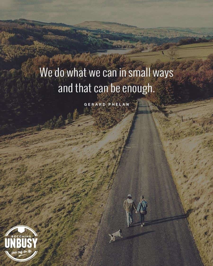 A road in the country with the quote, "We do what we can in small ways and that can be enough."
