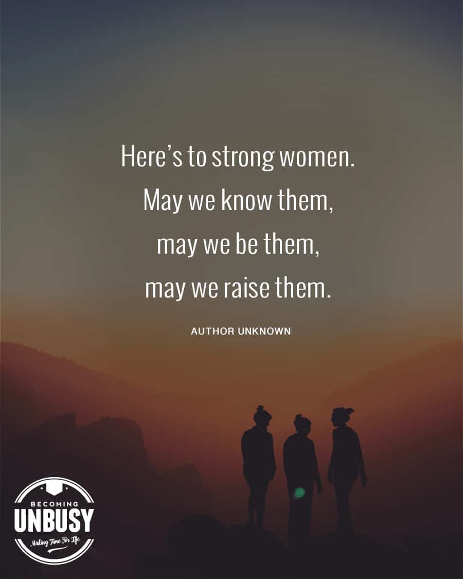 Silhouette of three woman on a mountain top sunset with the empowering quote "Here's to strong women. May we know them, may we be them, may we raise them." 