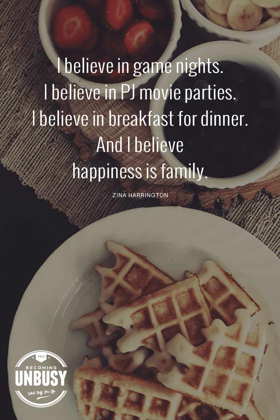 The following fall bucket list quote written over a photo of waffles and strawberries, "I believe in game nights. I believe in PJ movie parties. I believe in breakfast for dinner. And I believe happiness is family."
